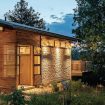 Exterior photo of awning windows on mountain cabin